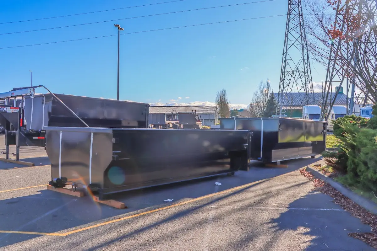 Roll-off dumpster ready for waste disposal at job site for Construction Dumpster Rental in Rusk